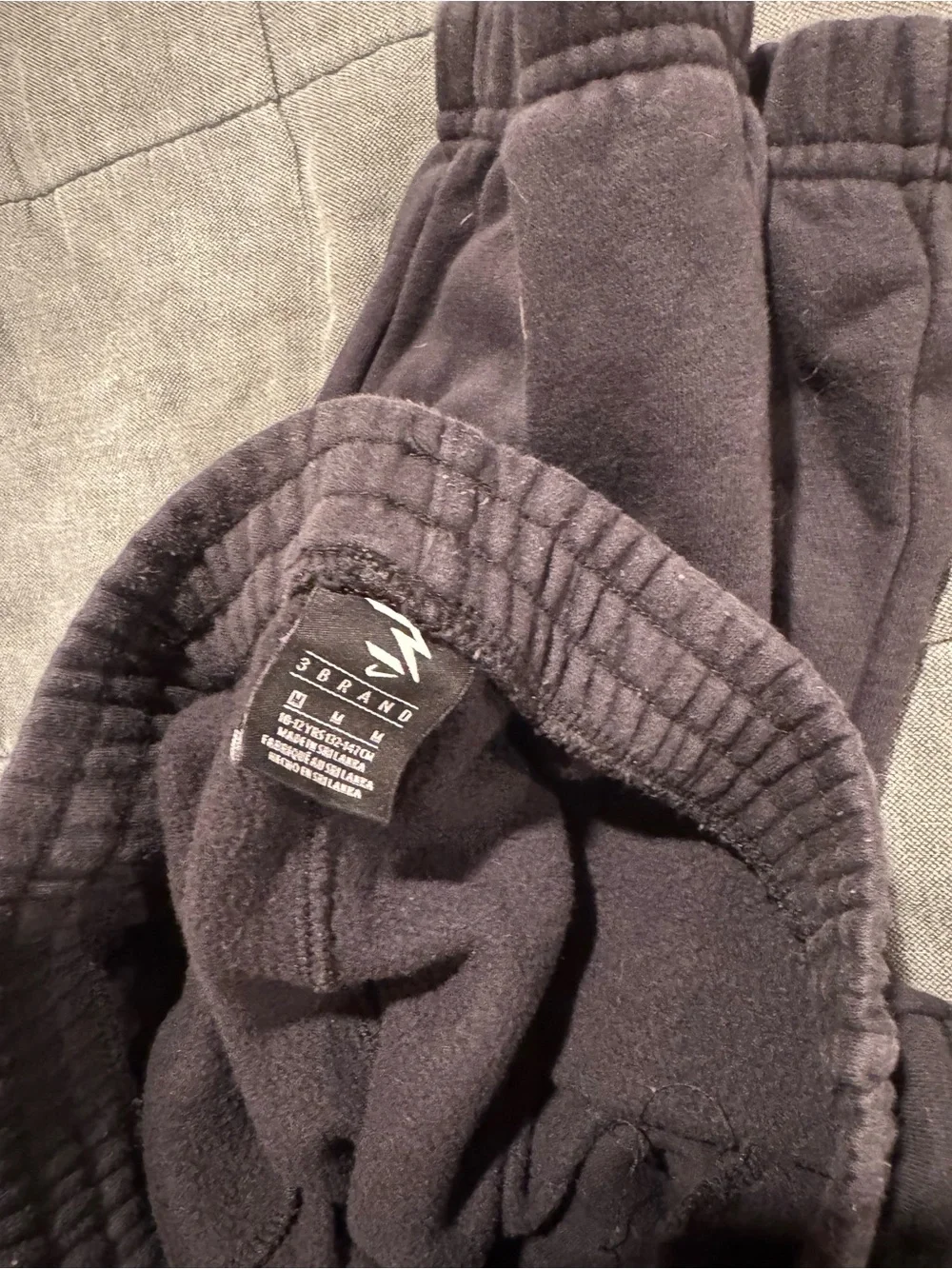 Nike Black Jogger Sweatpants with White Swoosh
